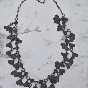 ANTIQUE BOOK PIECE ARTICULATED PRIMITIVE CUT OUT HEARTS NECKLACE
